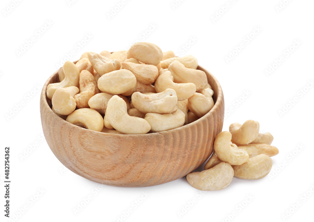 Bowl and tasty organic cashew nuts isolated on white Bowl and tasty organic cashew nuts isolated on white