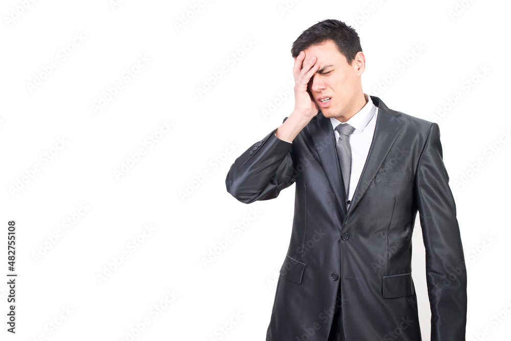 Tired man in suit suffering from headache Tired man in suit suffering from headache