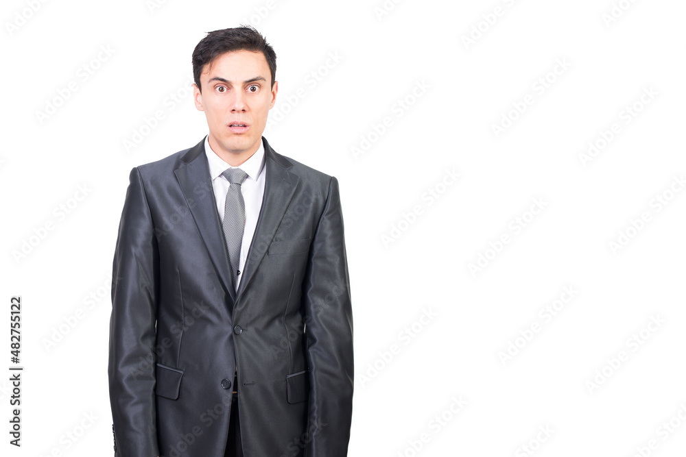 Shocked man in formal suit gazing with eyes wide open Shocked man in formal suit gazing with eyes wide open