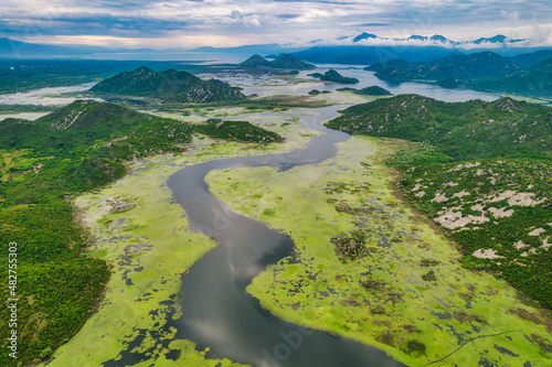 Amazing curves of Skadar Lake in National Park in Montenegro, aerial view