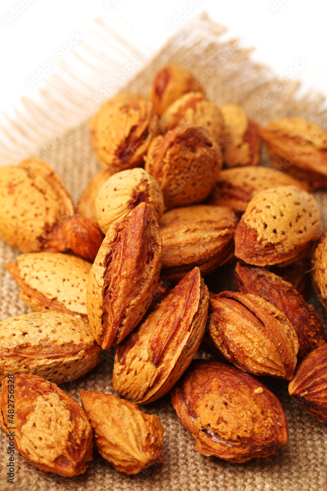 almonds nuts on white background almonds nuts on white background