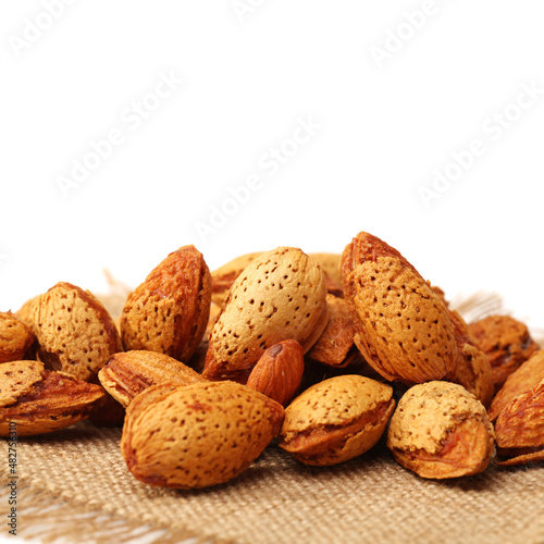  almonds nuts on white background.