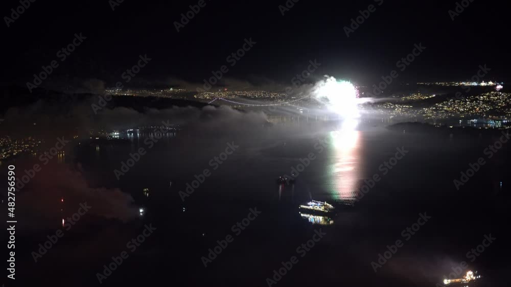 Beautiful New-year fireworks beside Askoy bridge in Bergen Norway - Static midnight clip from mountain Stoltzen Beautiful New-year fireworks beside Askoy bridge in Bergen Norway - Static midnight clip from mountain Stoltzen