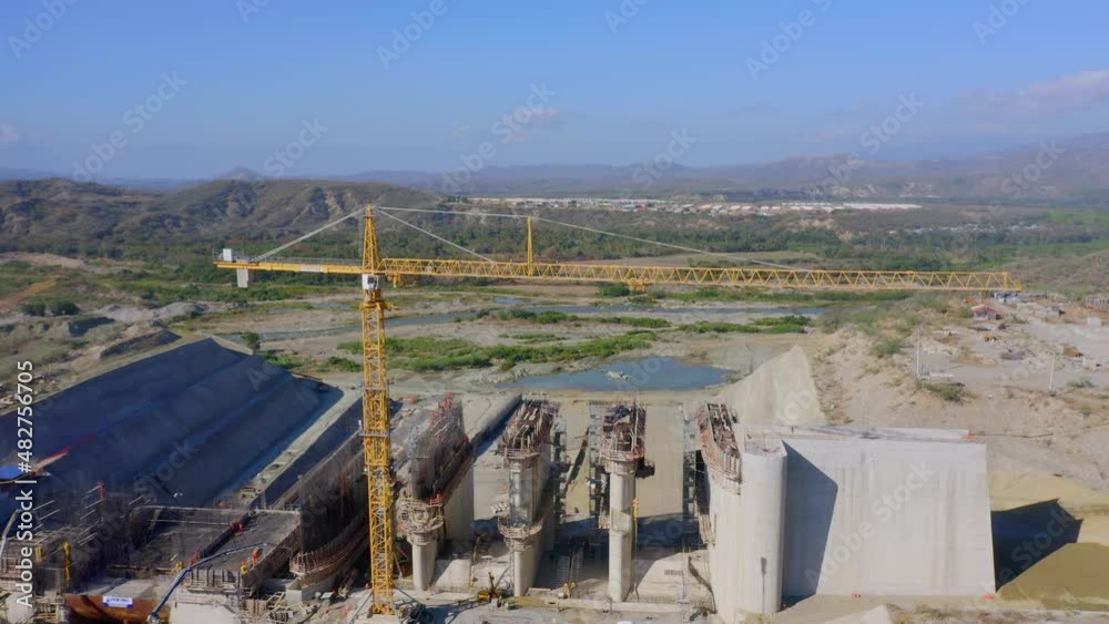 Tower Crane At The Construction Site Of Monte Grande Dam In Barahona, Dominican Republic. aerial
