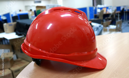 Photos of red safety helmets are usually used by workers to protect their heads
