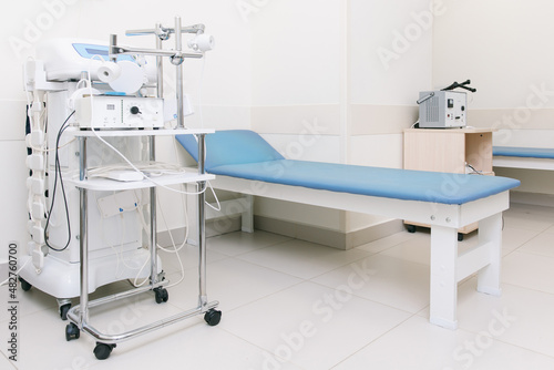 Hospital diagnostic room. Modern medical equipment, preventional medicine and healthcare concept. Modern hospital laboratory. Treatment room. Physiotherapy. Doctor office interior.