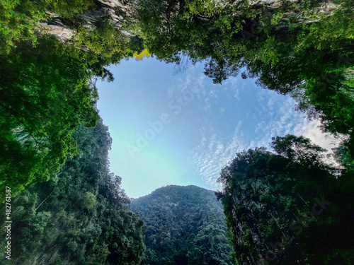 Look up view towards limestone hills in Tasik Cermin, Ipoh, Malaysia. © NoorRadya