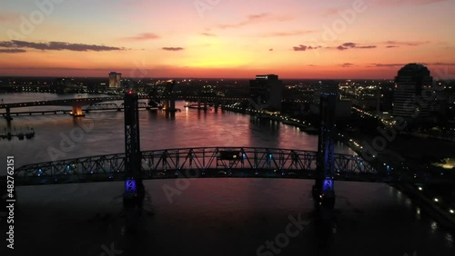 John T. Alsop Jr. Bridge Next To Acosta Bridge Over The St Johns River At Dusk In Jacksonville, Florida, USA. - aerial photo