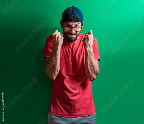Angry glasses man, furious latin man, angry man concept, aggressive person concept.
