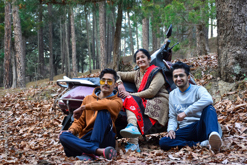 mother and his son in long trips , this is the way of india family chill out time in winter vacation ,family holiday chill out time with your two wheeler and enjoy .