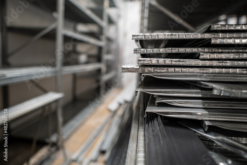 Irons stacked in a warehouse during assembly