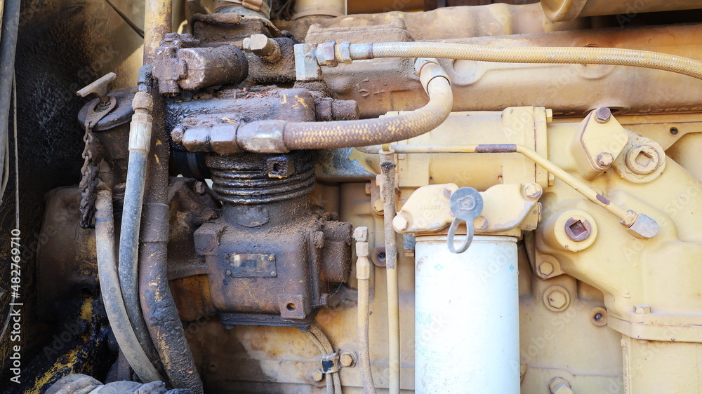 Old heavy machinery air compressor. Dirty and leaking air compressor