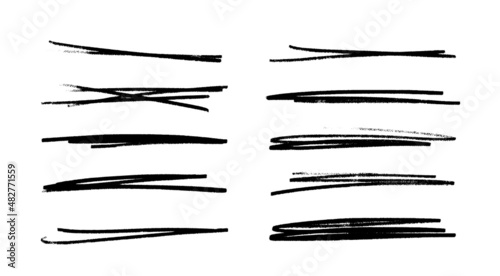 Strikethrough lines isolated. Set of different doodle underlines. Grunge collection of brush strokes written on a white background. Horizontal hand drawn marker stripes. photo