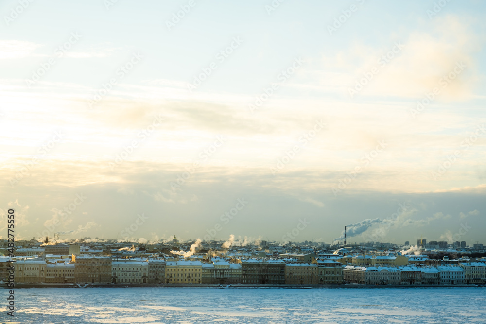 St. Petersburg, Russia - December, 2021: View of frozen Neva River and city center in sunny day.