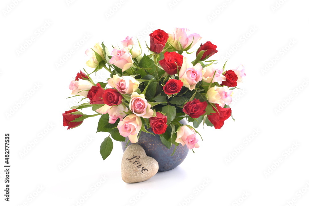 Valentines day bouquet of flowers. Red and pink roses, and heart - love.