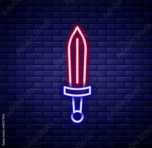 Glowing neon line Medieval sword icon isolated on brick wall background. Medieval weapon. Colorful outline concept. Vector