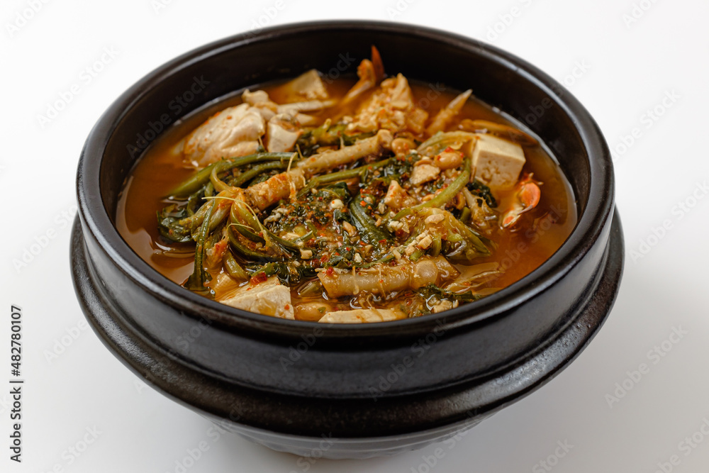 Soybean paste stew with shepherd's purse and crab on a white background