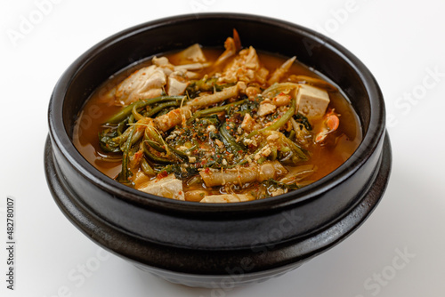 Soybean paste stew with shepherd's purse and crab on a white background