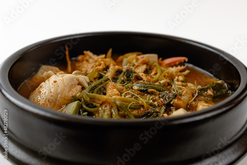 Soybean paste stew with shepherd's purse and crab on a white background