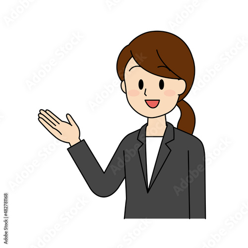 案内先を示しているスーツを着た女性