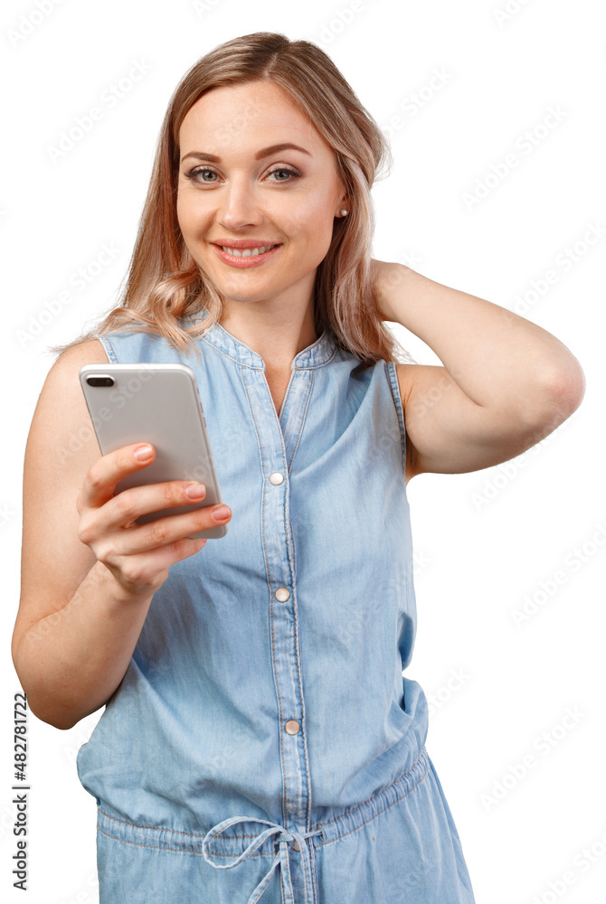 Portrait of a smiling casual woman holding smartphone over white background Portrait of a smiling casual woman holding smartphone over white background