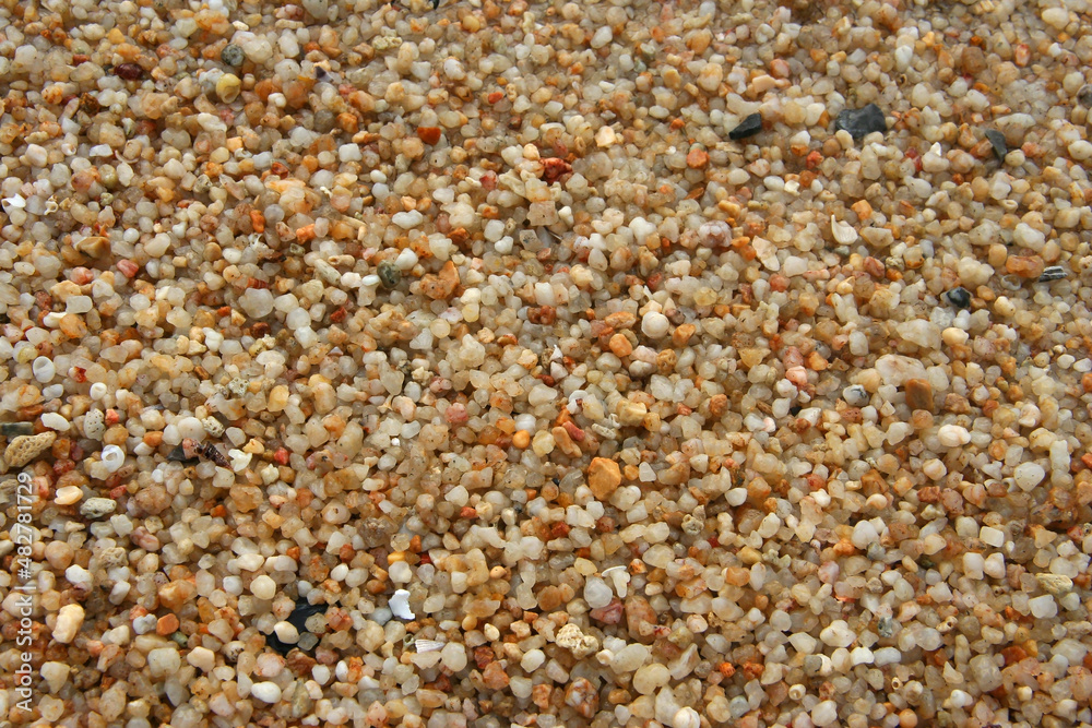 Close up of stones and marble. Smooth and polished. Pebble on shingle beach. Colorful small pebble and stone texture. Pebble background. Gravel pebble or rock fragments, beach sand Close up of stones and marble. Smooth and polished. Pebble on shingle beach. Colorful small pebble and stone texture. Pebble background. Gravel pebble or rock fragments, beach sand