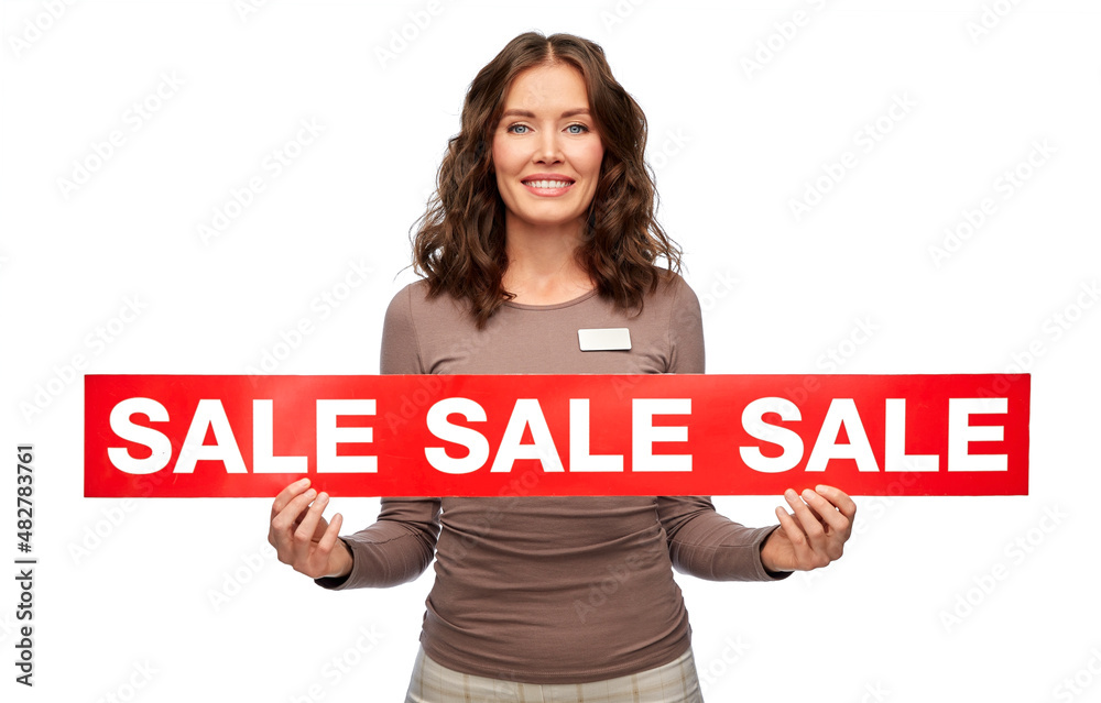 sale and business concept - happy female shop assistant or saleswoman holding red banner over white background sale and business concept - happy female shop assistant or saleswoman holding red banner over white background