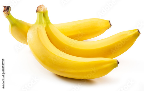 Three perfect ripe yellow bananas isolated on white background.