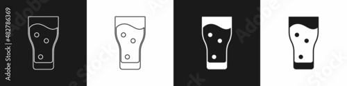 Set Glass of beer icon isolated on black and white background. Vector