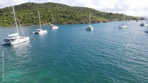 exciting low flying aerial of a bay and sailing yachts in the British Virgin Islands, sailing hotspot photo