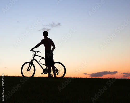 silhouette of a cyclist on the sunset © kieferpix
