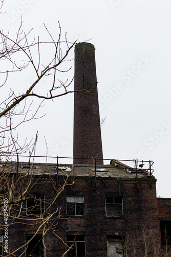  Old Crimble Mill factory chimney outside Heywood Town, Greater manchester, England photo