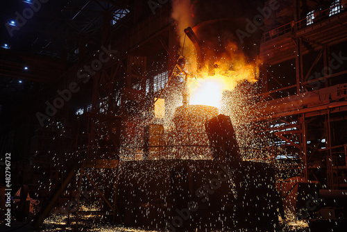 Ingot casting, casting foundry. Ladle-furnace. Iron smelting, Steel production. Electric steel furnace. Metallurgy. Industry steel production. 