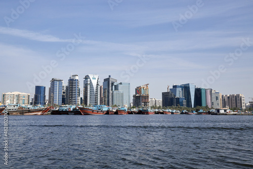 View of the city of Dubai from a boat in the old Abra port  UAE