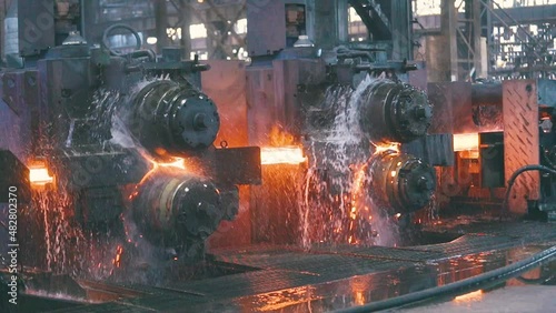 Metal production process in a metallurgical factory. Red hot metal in a modern factory. Modern metallurgical factory