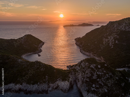 Aerial drone photo of iconic paradise bay of Porto Timoni with tropical deep blue and turquoise clear sea, Corfu island, Ionian, Greece