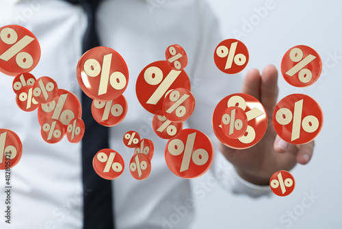 sale digital percent in hand.