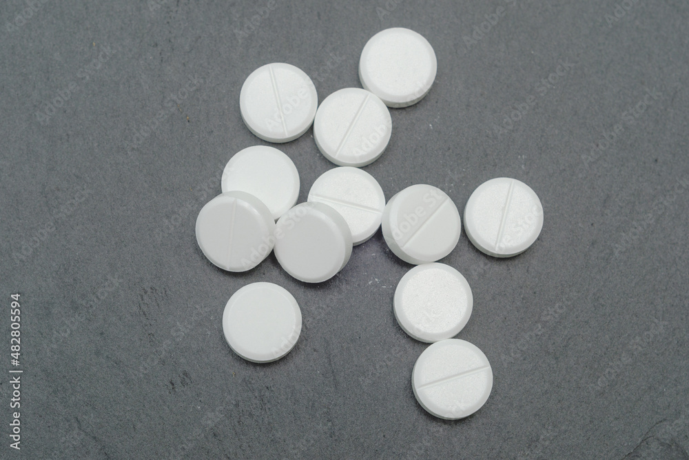 large and round white tablets large and round white tablets