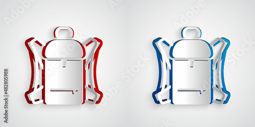 Paper cut Hiking backpack icon isolated on grey background. Camping and mountain exploring backpack. Paper art style. Vector