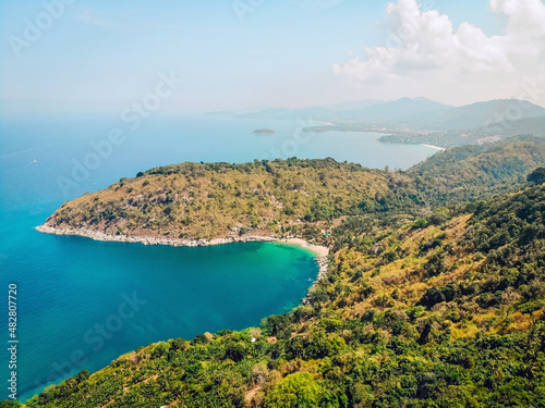 Obraz na plátně Top view or Aerial view of tropical island forest and emerald clear water of a m
