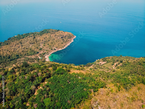 Tablou canvas Bird's eye view of tropical isolated island with beautiful coast, blue aqua sea