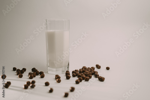 nesquik chocolate balls and a glass of milk 