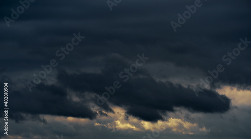 beautiful dark dramatic sky with stormy clouds before the rain or snow