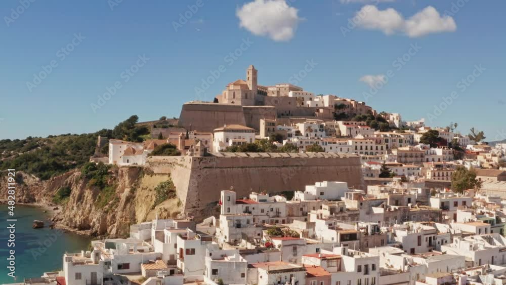 Aerial view of fortress in Ibiza city, the Old Town and the city walls of Eivissa, in the island of Ibiza, on a sunny and clear day.