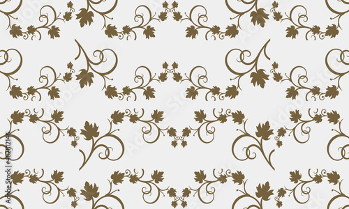 gray background with bunch of brown leaves