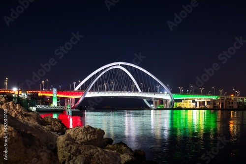 Photography Newly opened Infinity bridge with reflections of United Arab Emirates flag in Du