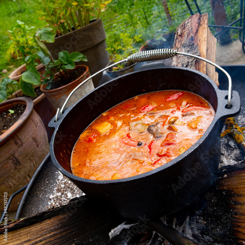 Kettle goulash is prepared over an open fire!