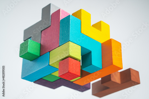 Abstract construction from wooden blocks. The concept of logical thinking..