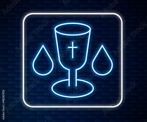 Glowing neon line Christian chalice icon isolated on brick wall background. Christianity icon. Happy Easter. Vector