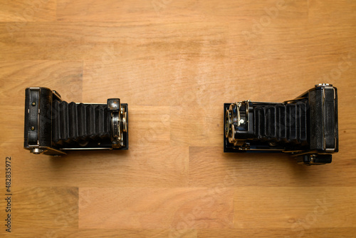old camera on a wooden table